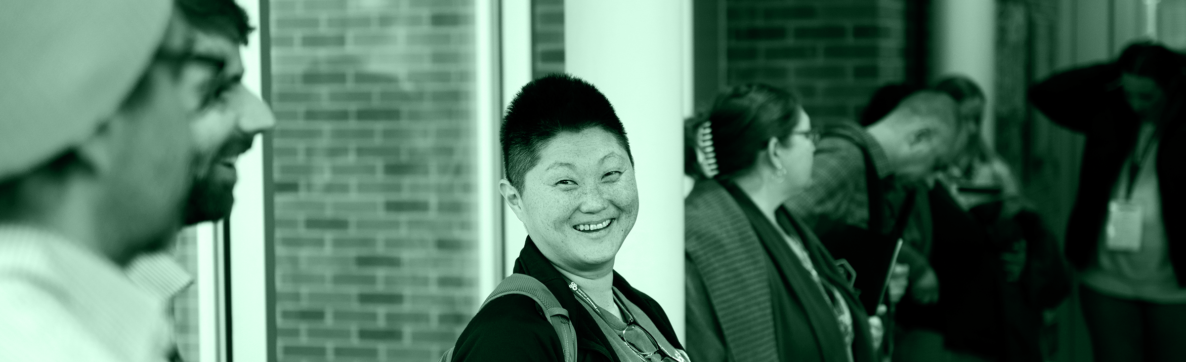 A woman smiling at the camera